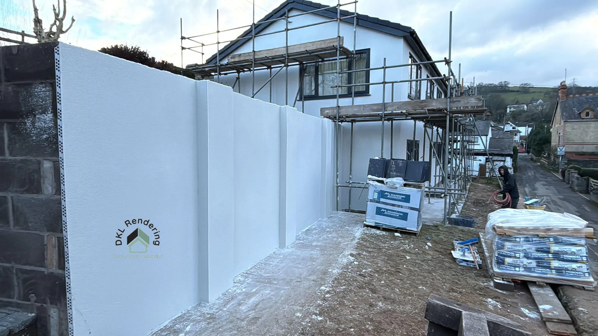External wall insulation and render system being installed in Lancashire