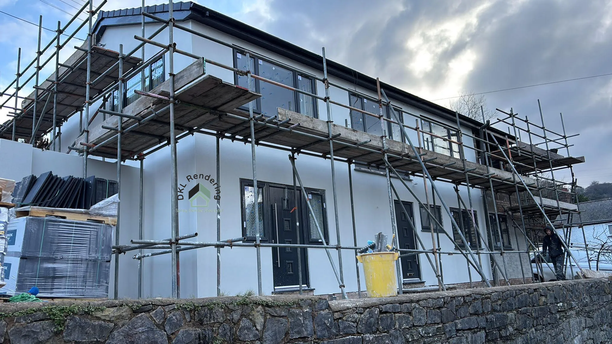 Spray rendering a house exterior in Lancashire